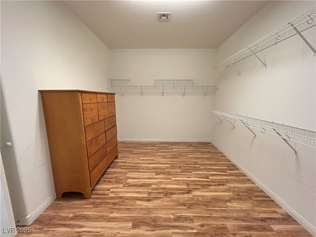 5553 Fairmeade Way Las Vegas, NV 89135 - Photo 22 of 42 Spacious closet featuring light wood-type flooring