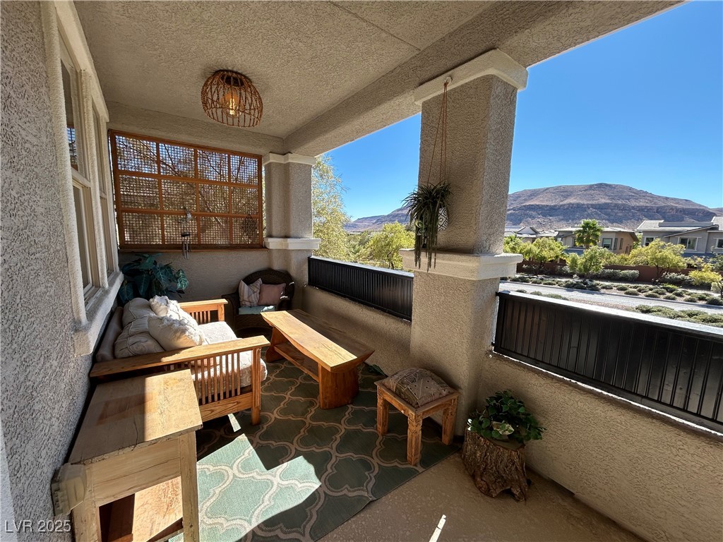 5553 Fairmeade Way Las Vegas, NV 89135 - Photo 23 of 42 Balcony featuring a mountain view and outdoor lounge area