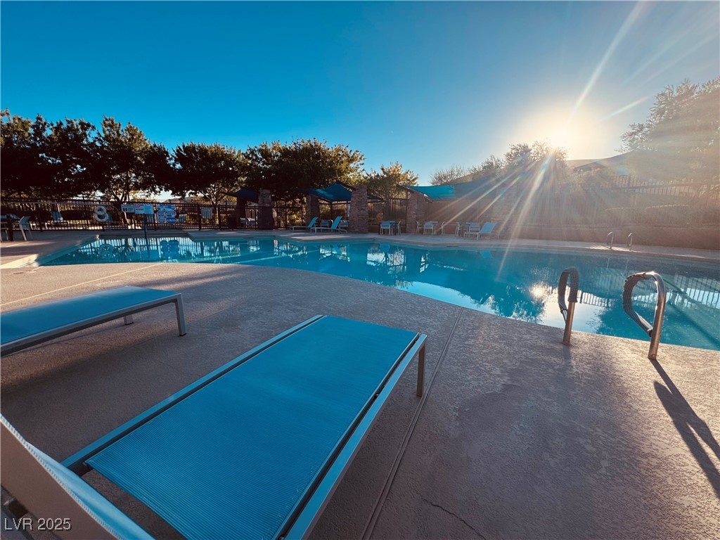 5553 Fairmeade Way Las Vegas, NV 89135 - Photo 40 of 42 Community pool with a patio area