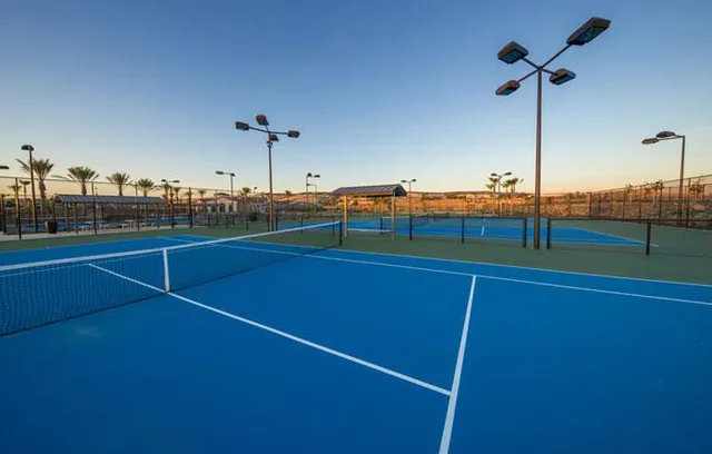 a backyard view with a seating space