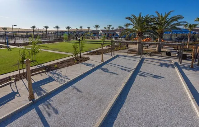 a view of a swimming pool with a patio