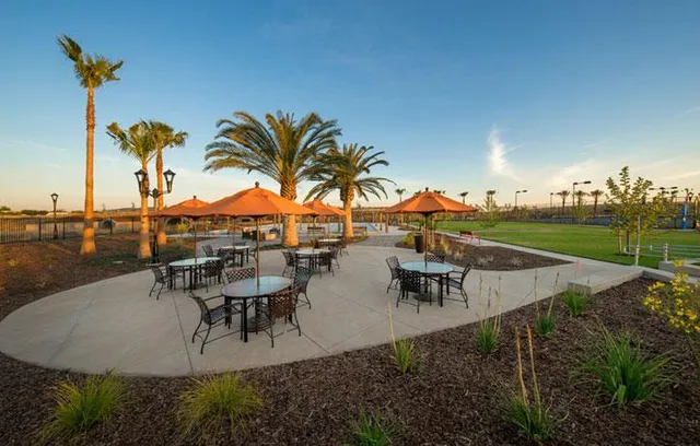 a view of outdoor space with seating area and swimming pool