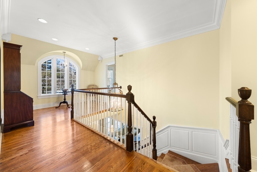 711 South County Line Road Hinsdale, IL 60521 - Photo 17 of 42 a view of hallway with wooden floor