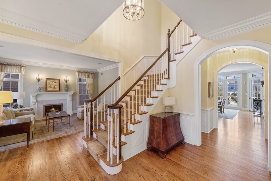 711 South County Line Road Hinsdale, IL 60521 - Photo 3 of 42 a view of entryway with wooden floor and furniture