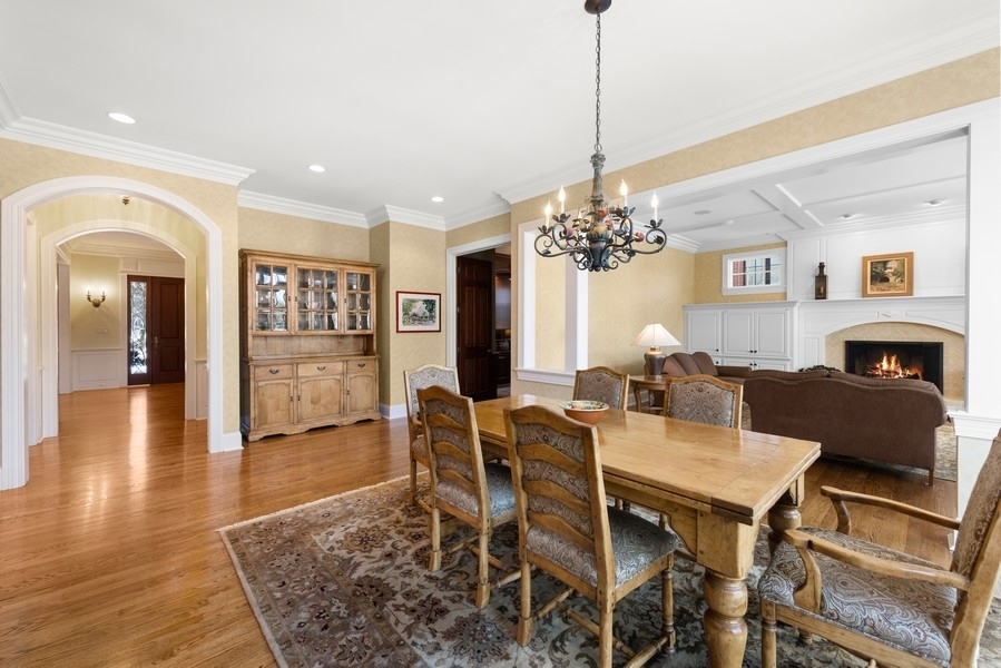 711 South County Line Road Hinsdale, IL 60521 - Photo 10 of 42 a view of a dining room with furniture and chandelier