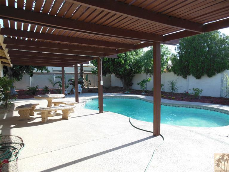 41625 Lima Hall Road Bermuda Dunes, CA 92203 - Photo 9 of 14 a view of a backyard with swimming pool