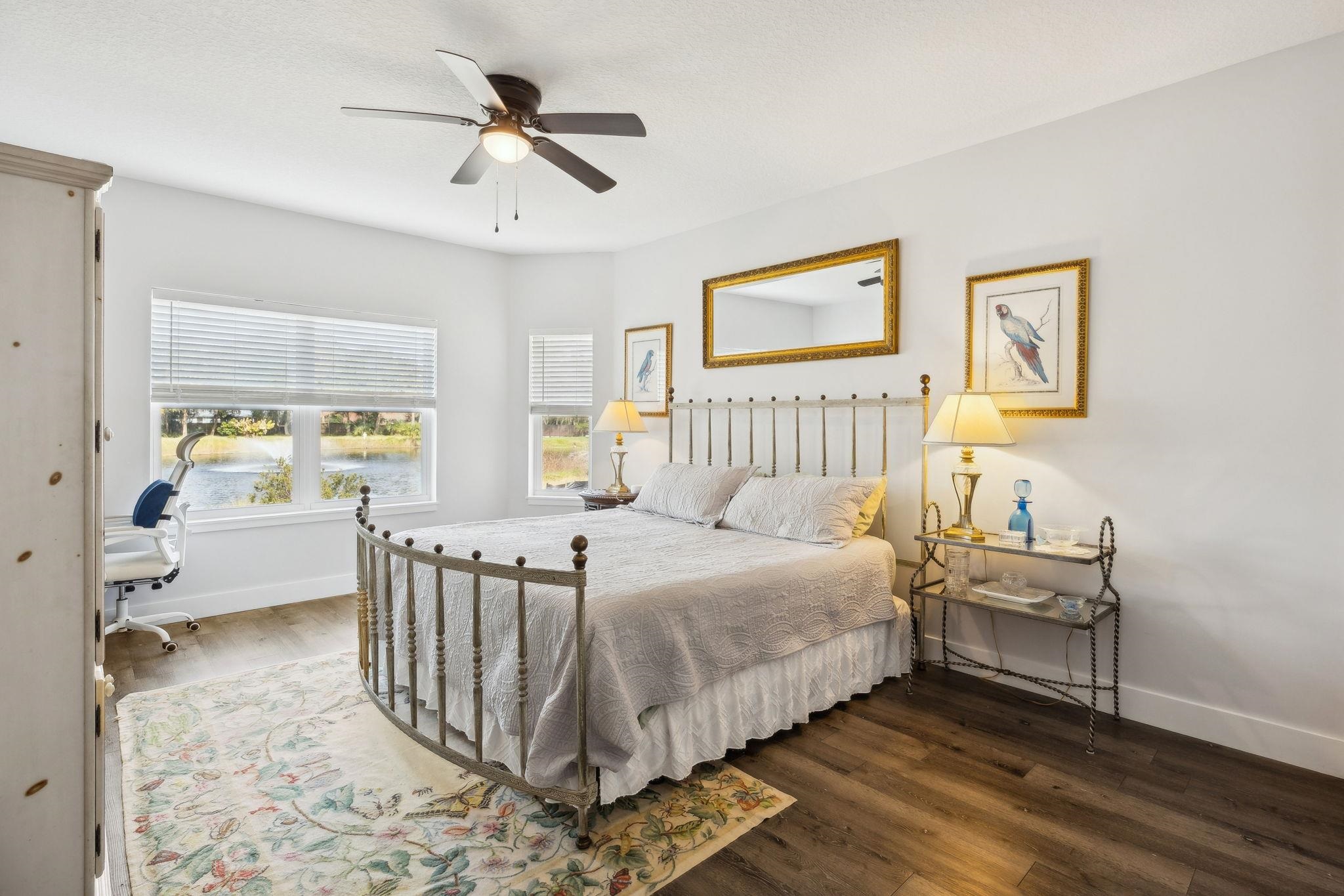 121 Spoonbill Point Court St. Augustine, FL 32080 - Photo 26 of 56 a bedroom with a bed and a table
