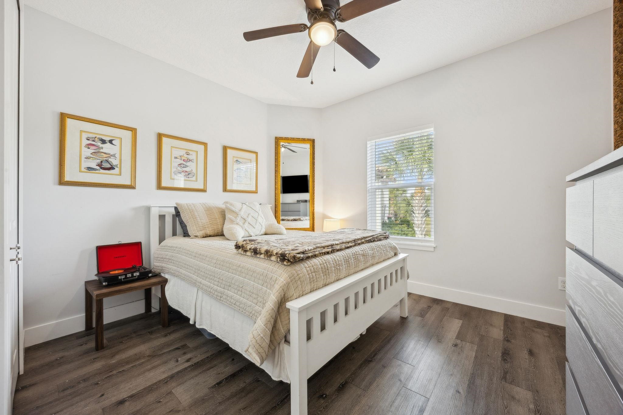 121 Spoonbill Point Court St. Augustine, FL 32080 - Photo 31 of 56 a bedroom with a bed and a window