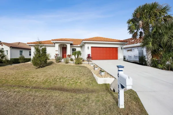 a house view with a garden space