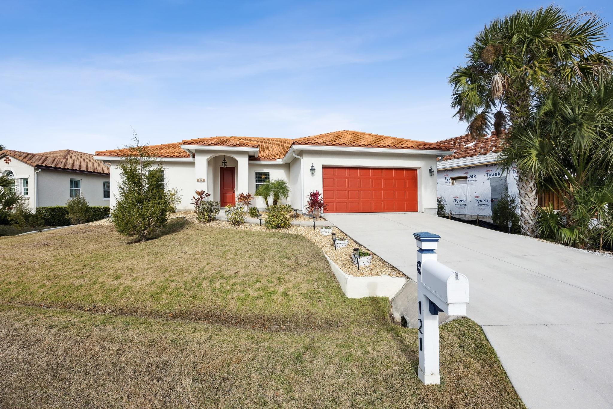 121 Spoonbill Point Court St. Augustine, FL 32080 - Photo 5 of 56 a house view with a garden space