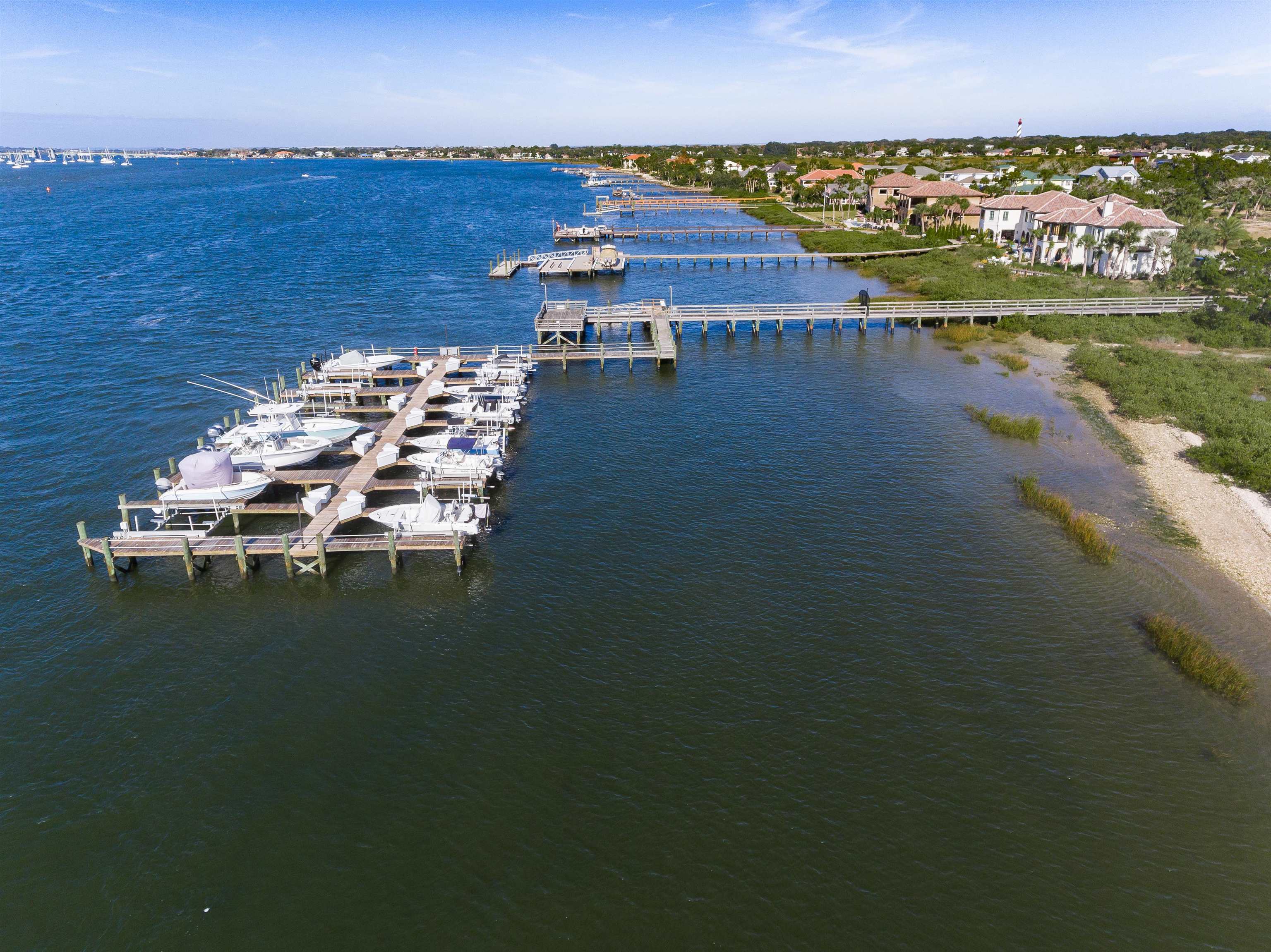 121 Spoonbill Point Court St. Augustine, FL 32080 - Photo 50 of 56 an aerial view of residential houses with outdoor space and lake view