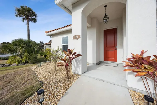 a house view with a outdoor space