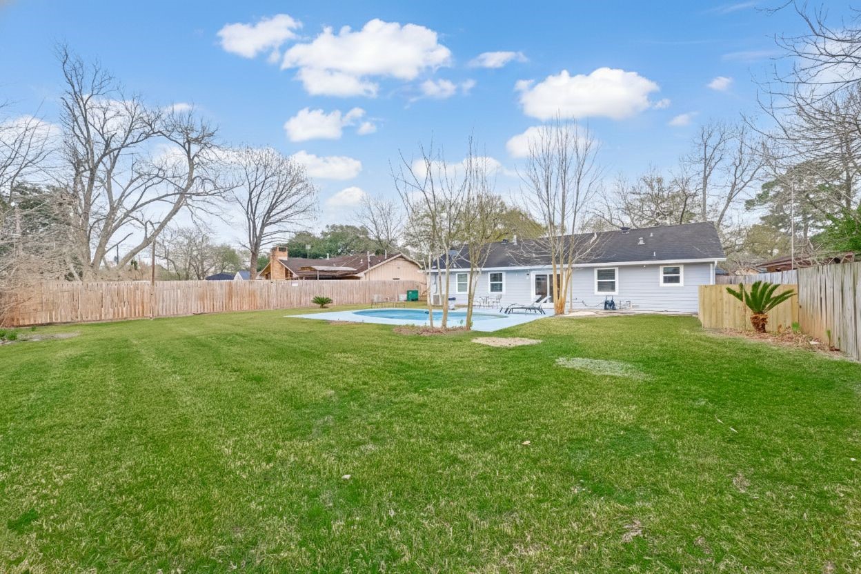 5330 Hialeah Drive Houston, TX 77092 - Photo 27 of 29 a view of a house with a big yard