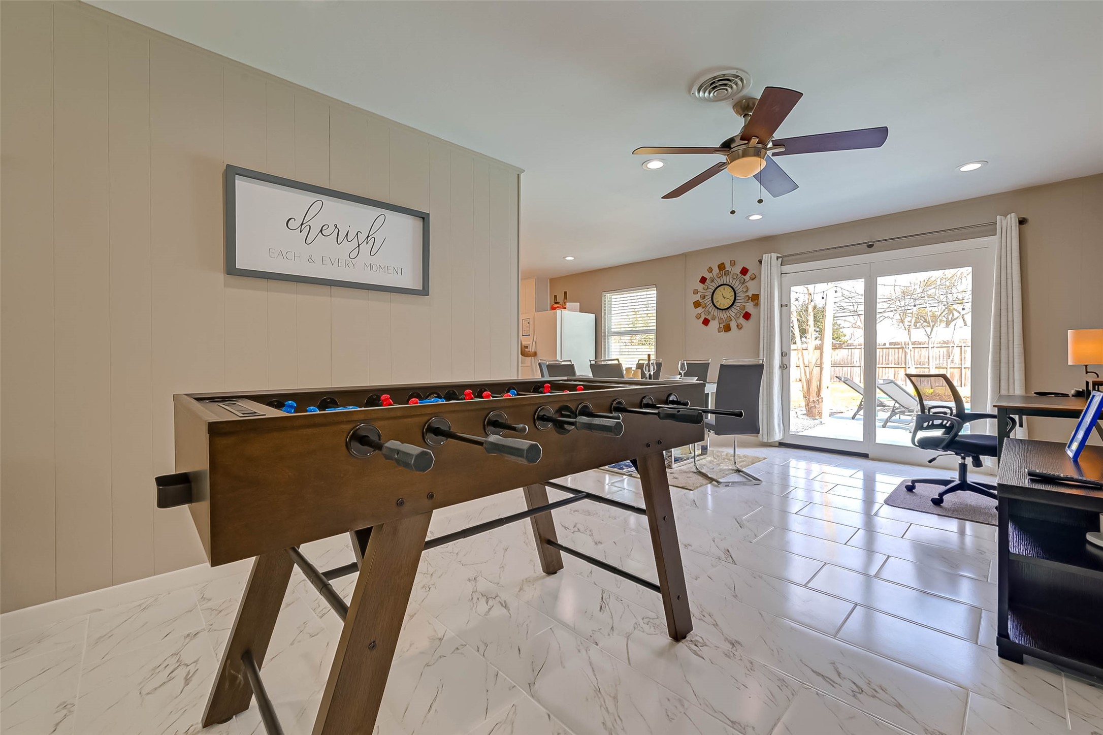 5330 Hialeah Drive Houston, TX 77092 - Photo 5 of 29 a living room with furniture a flat screen tv and a large window
