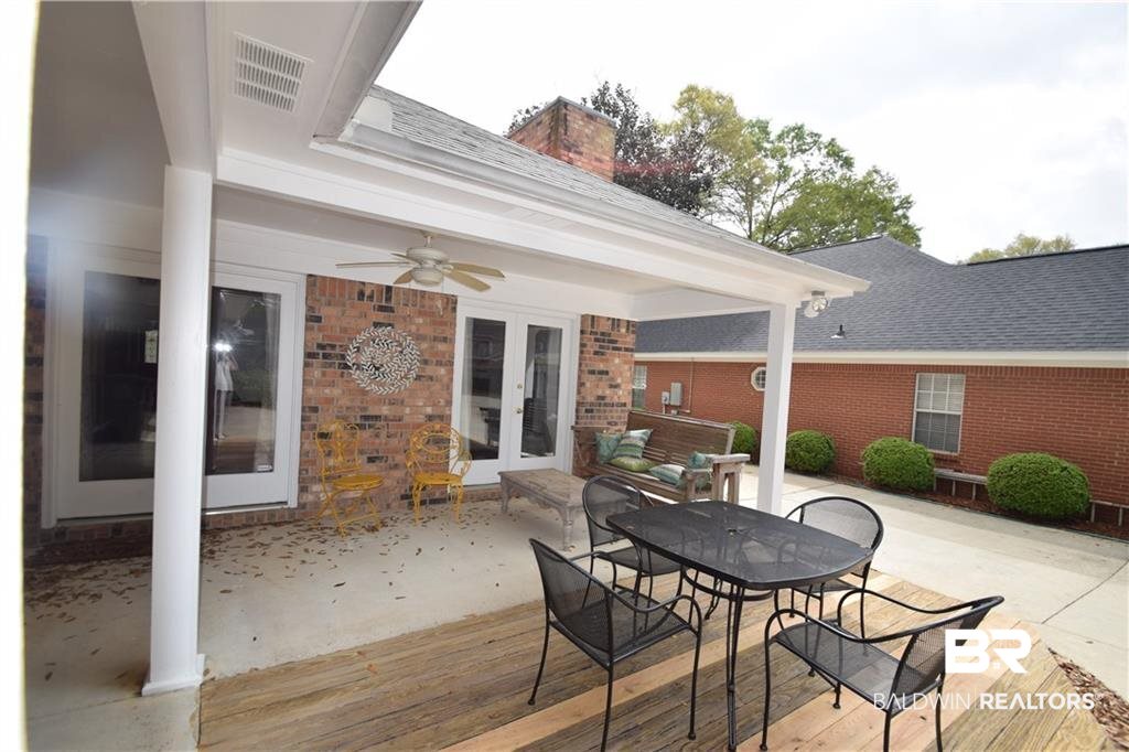 852 West Briar Court Mobile, AL 36609 - Photo 30 of 40 Covered porch with an extended deck area.