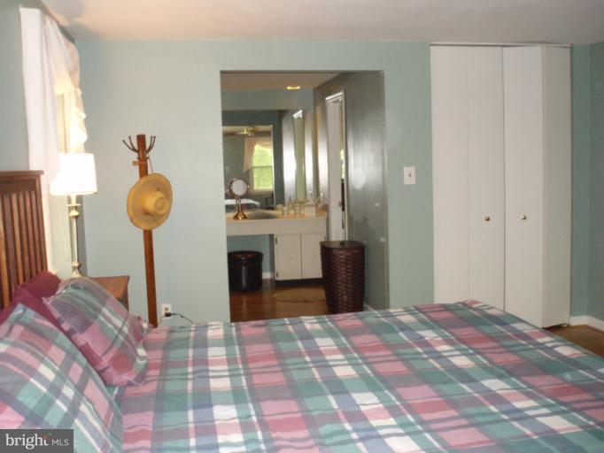 10705 Seneca Spring Way Gaithersburg, MD 20886 - Photo 19 of 28 Master Bedroom with view of dressing area