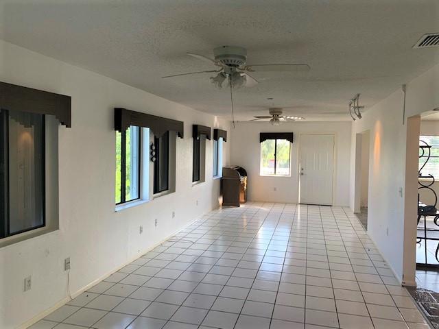 55 Lobstertail Road Big Pine Key, FL 33043 - Photo 4 of 25 Well Lit foyer with lots of windows