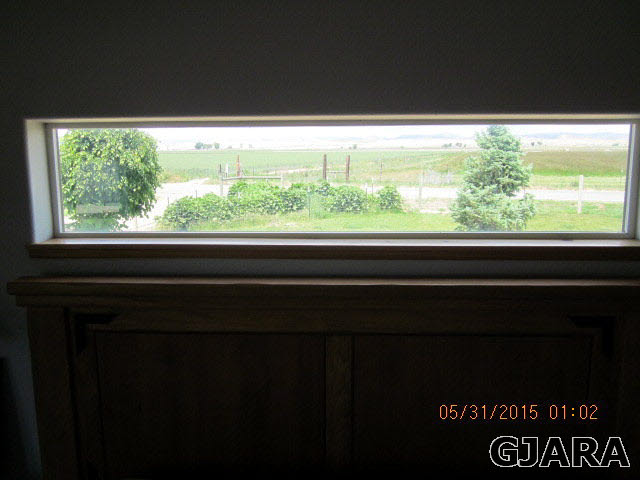 777 R Road Mack, CO 81525 - Photo 3 of 9 a view of a large window with a yard