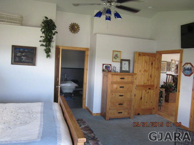 777 R Road Mack, CO 81525 - Photo 7 of 9 a view of a hallway to a bedroom