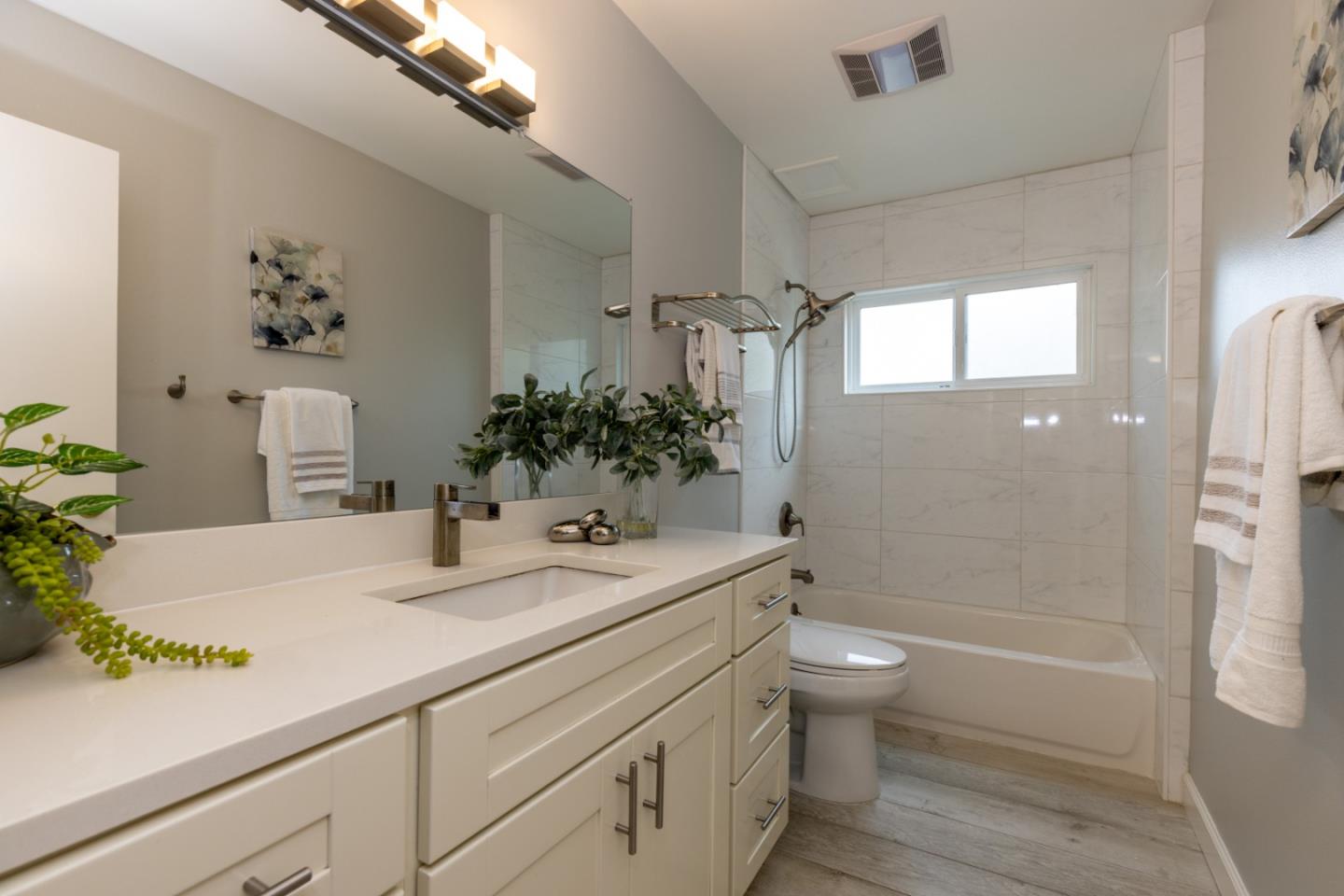 2379 Sharon Road Menlo Park, CA 94025 - Photo 16 of 19 a bathroom with a sink a toilet and shower