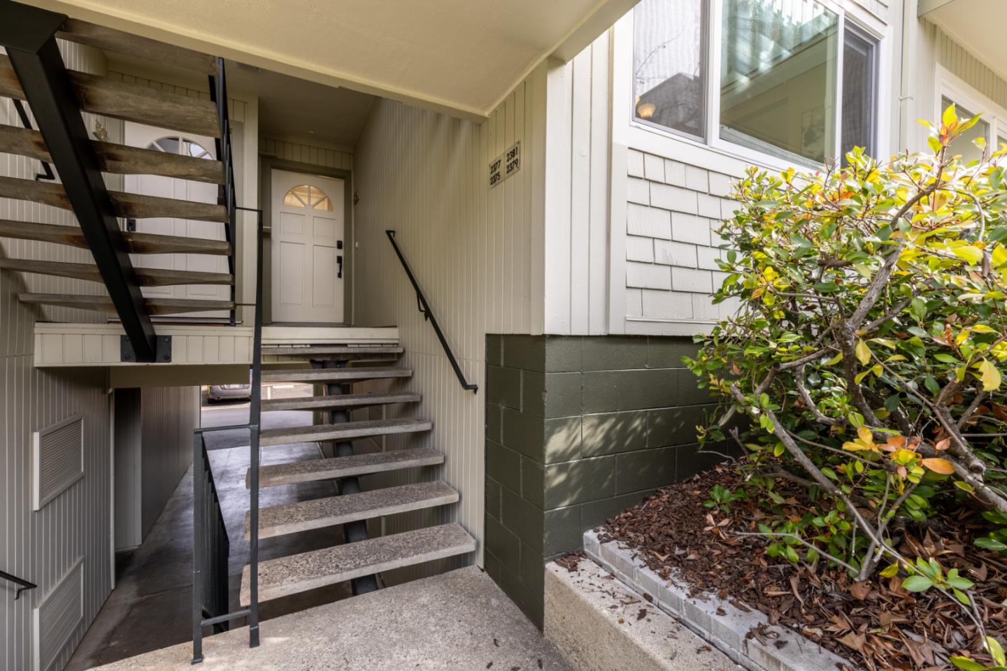 2379 Sharon Road Menlo Park, CA 94025 - Photo 2 of 19 a view of entryway with wooden floor and stairs