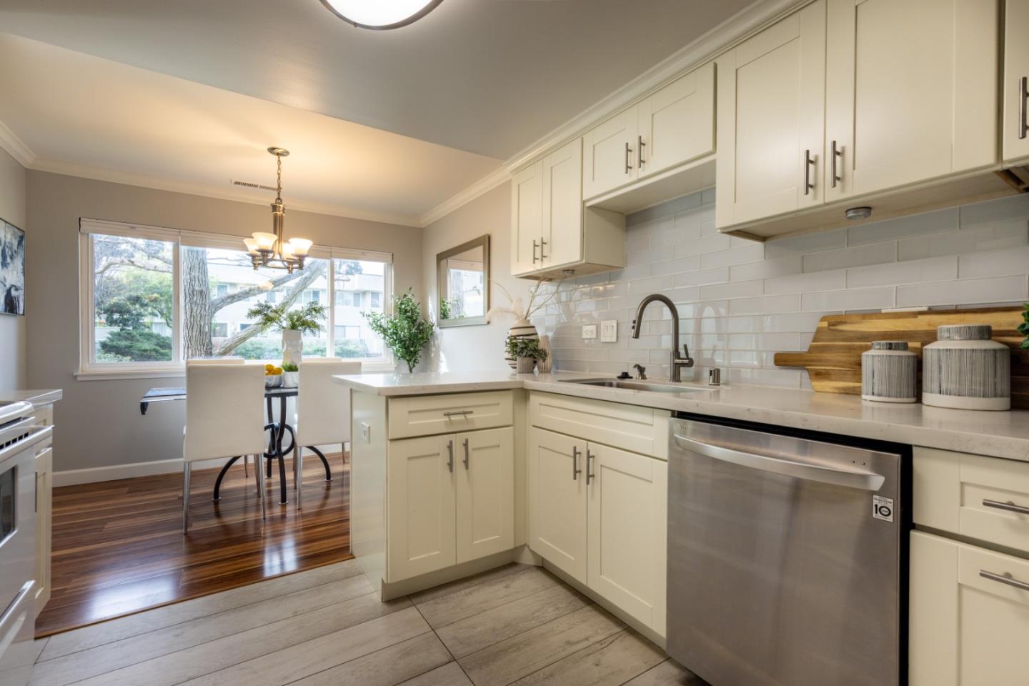 2379 Sharon Road Menlo Park, CA 94025 - Photo 5 of 19 a kitchen with cabinets appliances and a center island