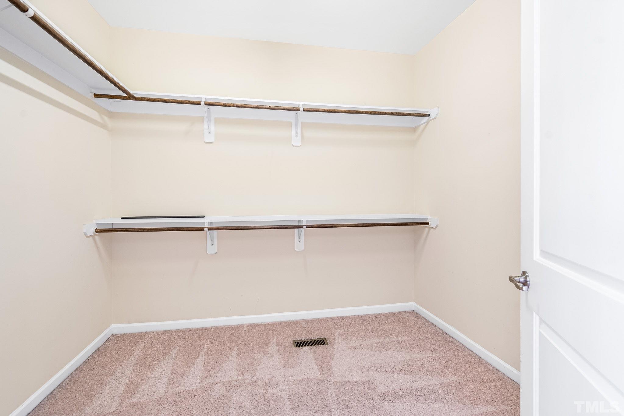 5637 Wade Park Boulevard Raleigh, NC 27607 - Photo 23 of 37 a view of an empty walk in closet