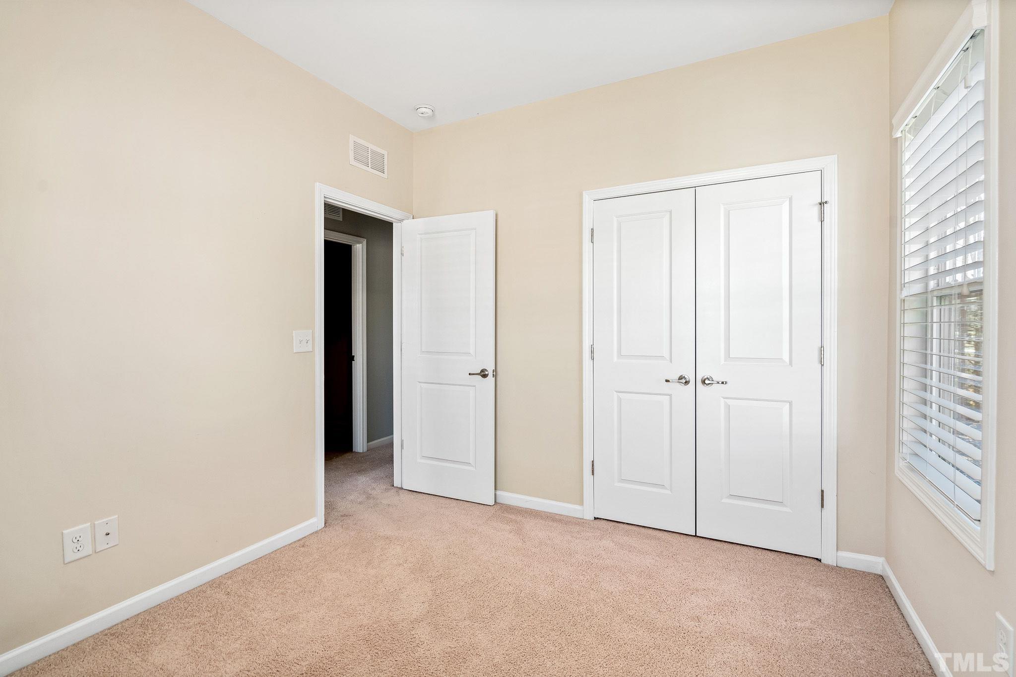 5637 Wade Park Boulevard Raleigh, NC 27607 - Photo 25 of 37 a view of an empty room with closet area