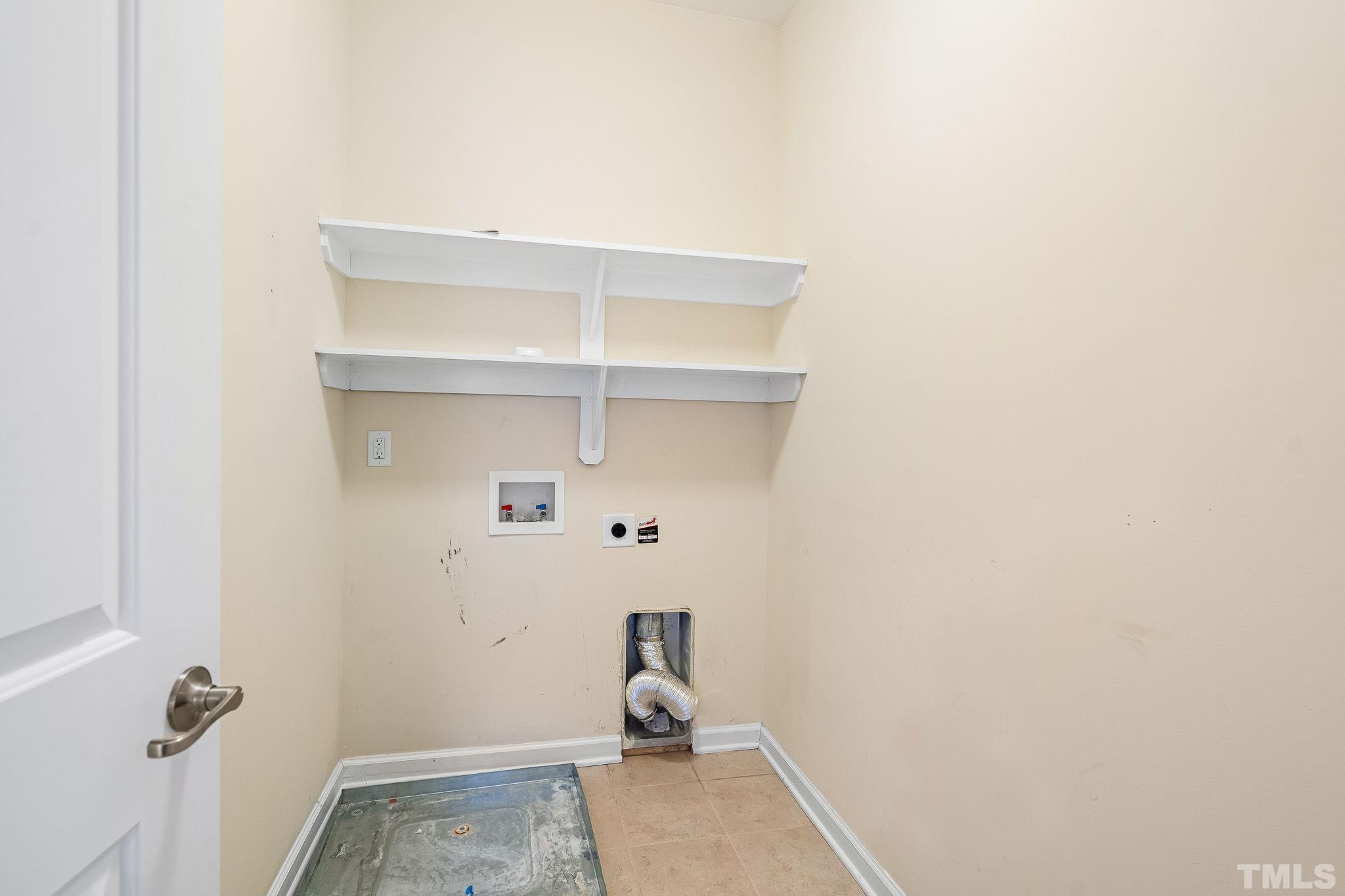 5637 Wade Park Boulevard Raleigh, NC 27607 - Photo 27 of 37 a room with a bench