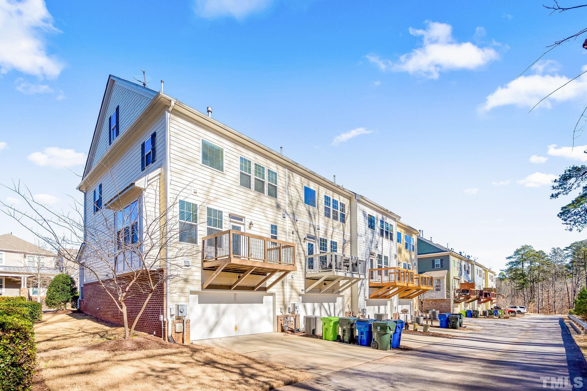 5637 Wade Park Boulevard Raleigh, NC 27607 - Photo 36 of 37 a front view of a building with street view