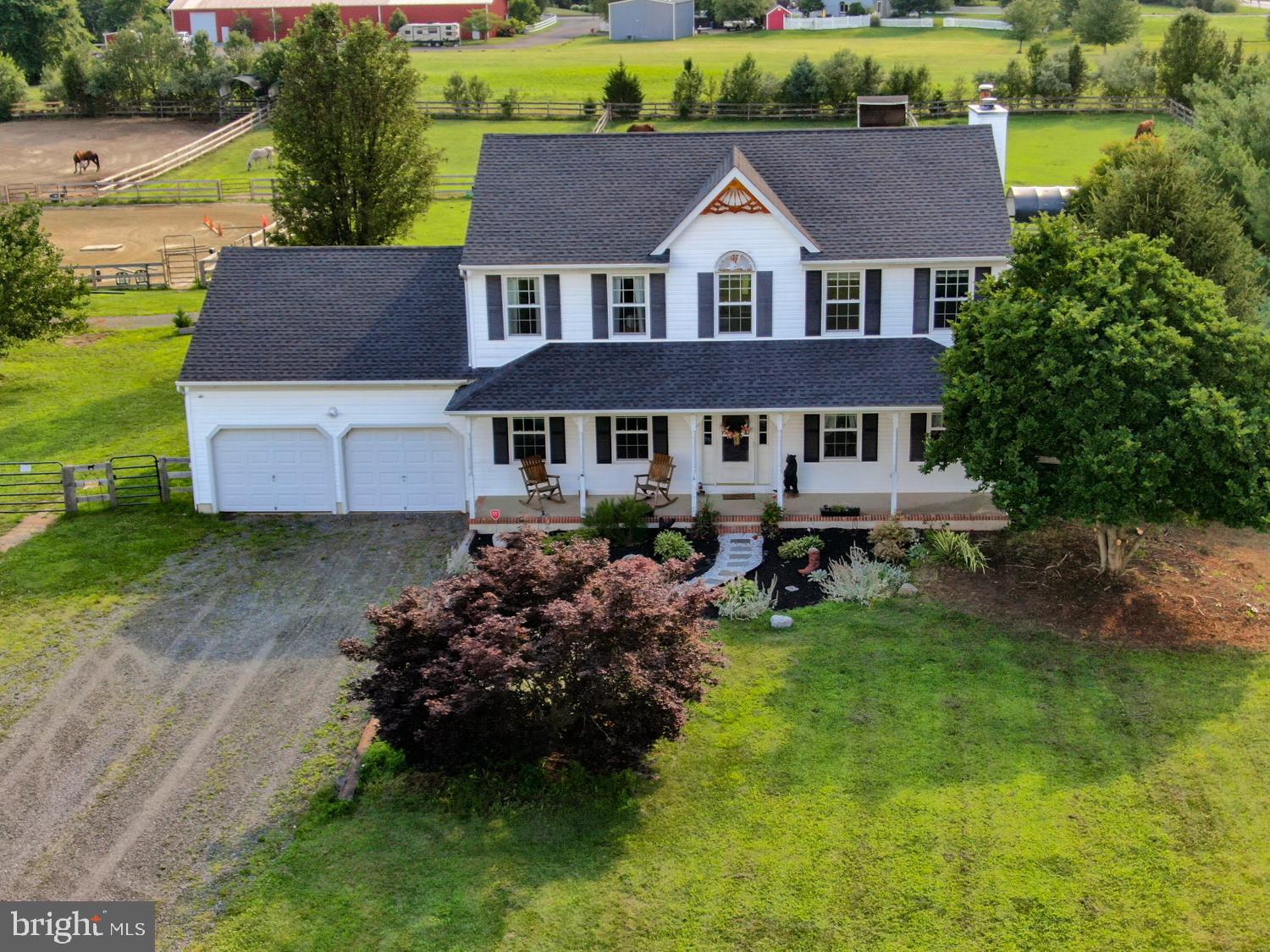 a aerial view of a house with garden