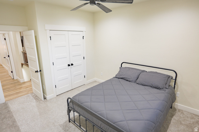 126 North 800 West Mapleton, UT 84664 - Photo 43 of 79 Bedroom featuring light carpet, a closet, and ceiling fan