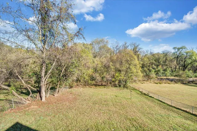 a view of mountain view with trees