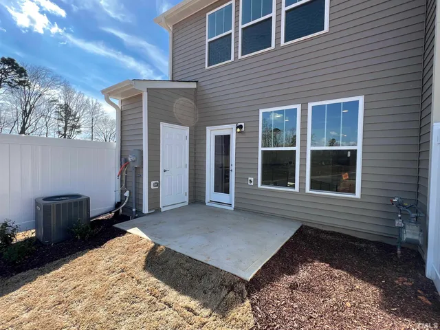 a kitchen with granite countertop a stove and a sink