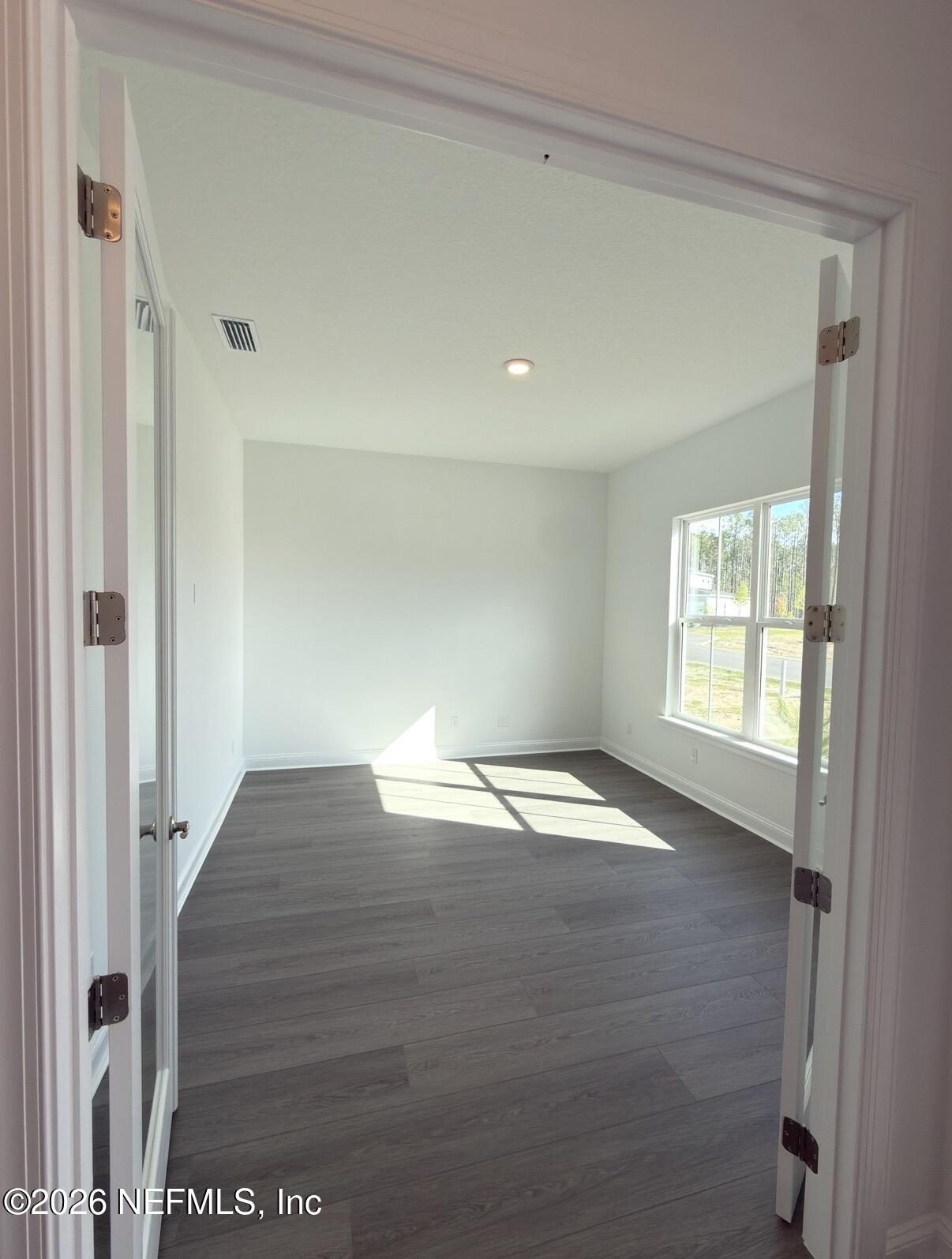 37 Callaway Circle St. Johns, FL 32259 - Photo 3 of 54 a view of empty room with wooden floor and fan