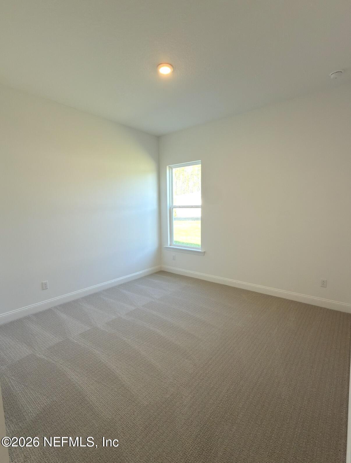37 Callaway Circle St. Johns, FL 32259 - Photo 7 of 54 an empty room with a window
