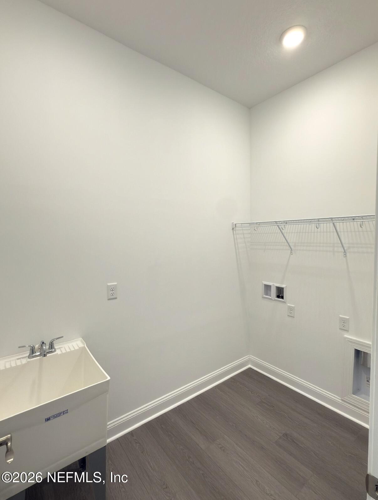 37 Callaway Circle St. Johns, FL 32259 - Photo 9 of 54 an empty room with a sink and wooden floor