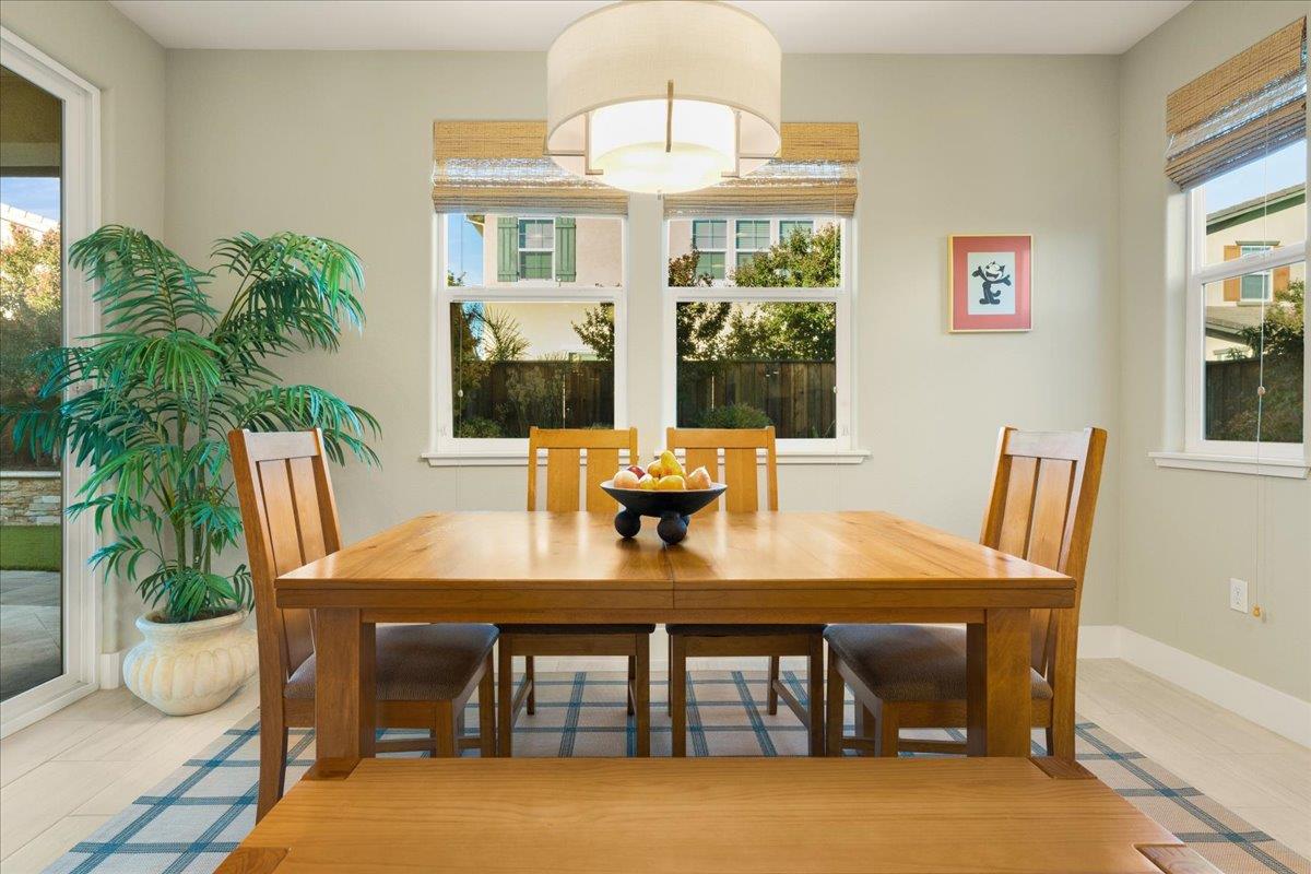 925 Lynx Place Gilroy, CA 95020 - Photo 17 of 49 a view of a dining room with furniture window and outside view
