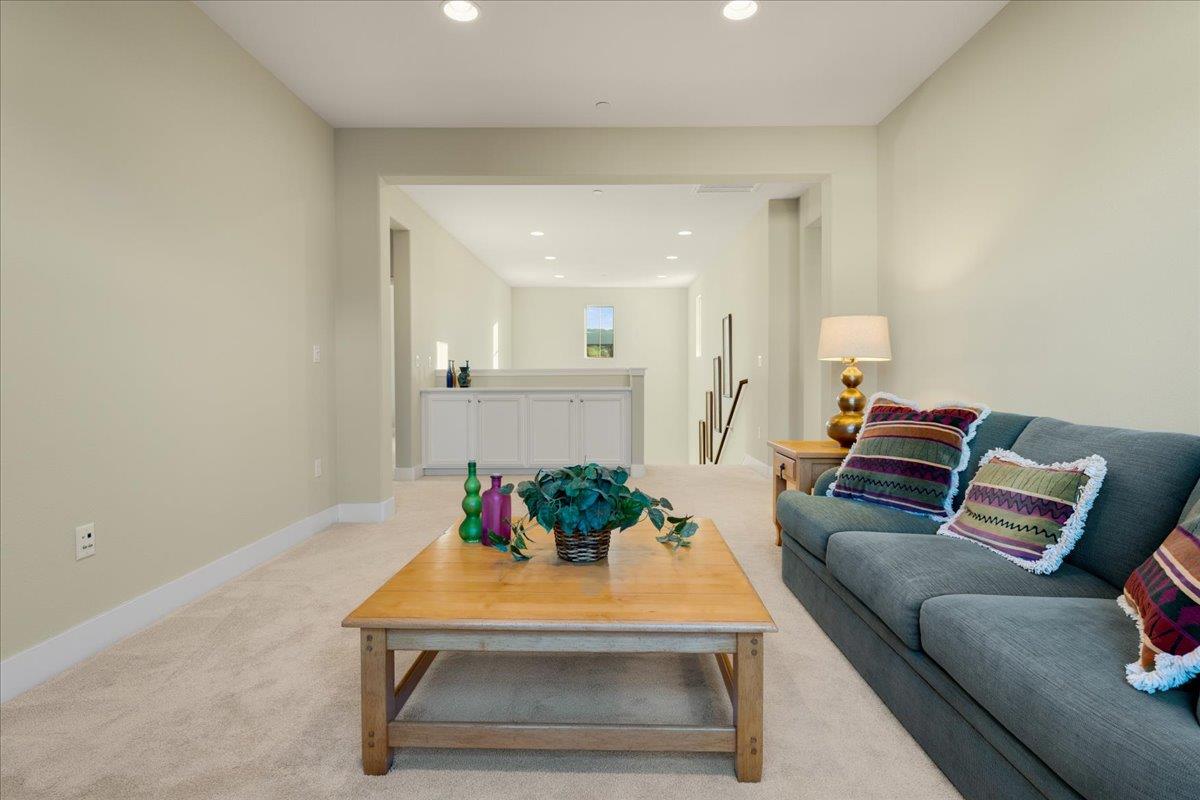 925 Lynx Place Gilroy, CA 95020 - Photo 23 of 49 a living room with furniture and a potted plant