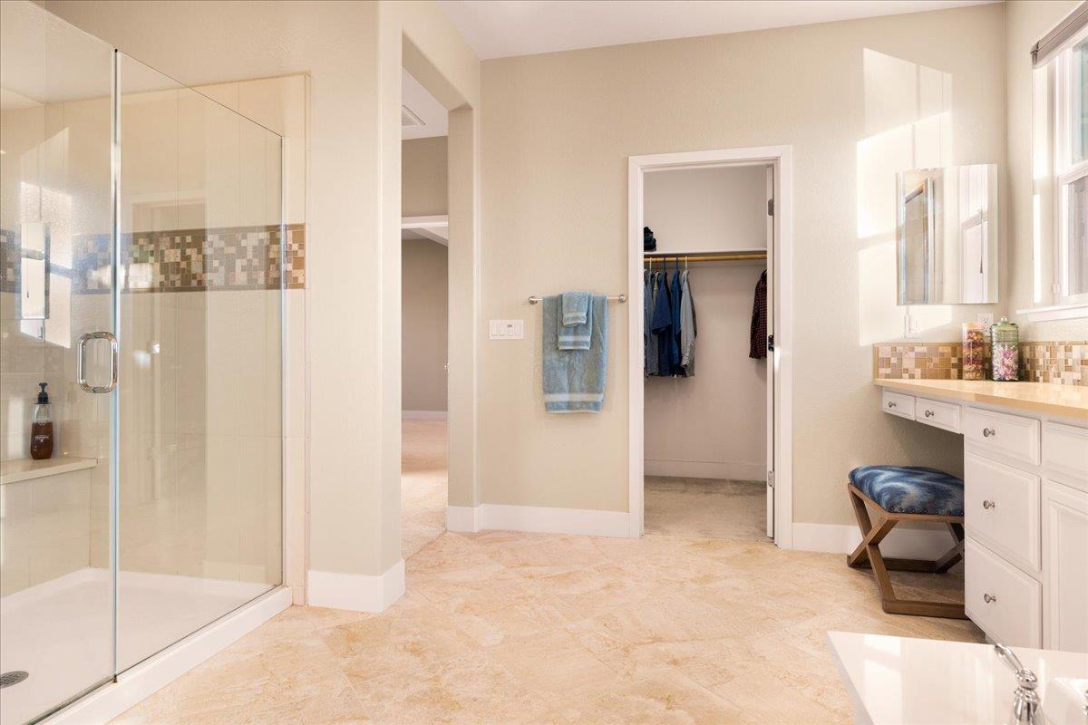 925 Lynx Place Gilroy, CA 95020 - Photo 27 of 49 a view of a bathroom with a tub and shower