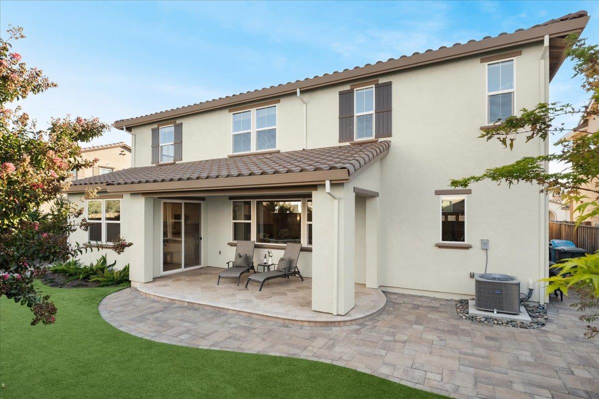 925 Lynx Place Gilroy, CA 95020 - Photo 35 of 49 a front view of a house with a yard