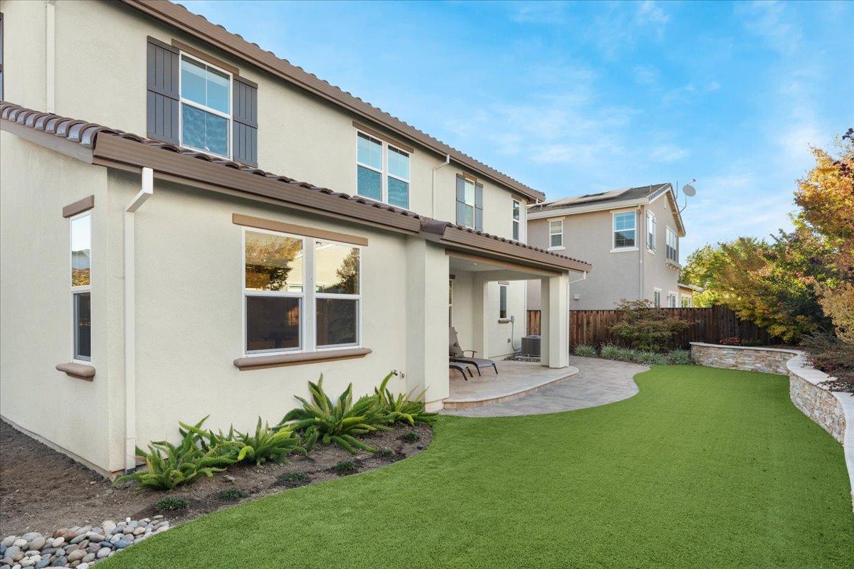 925 Lynx Place Gilroy, CA 95020 - Photo 36 of 49 a front view of a house with garden
