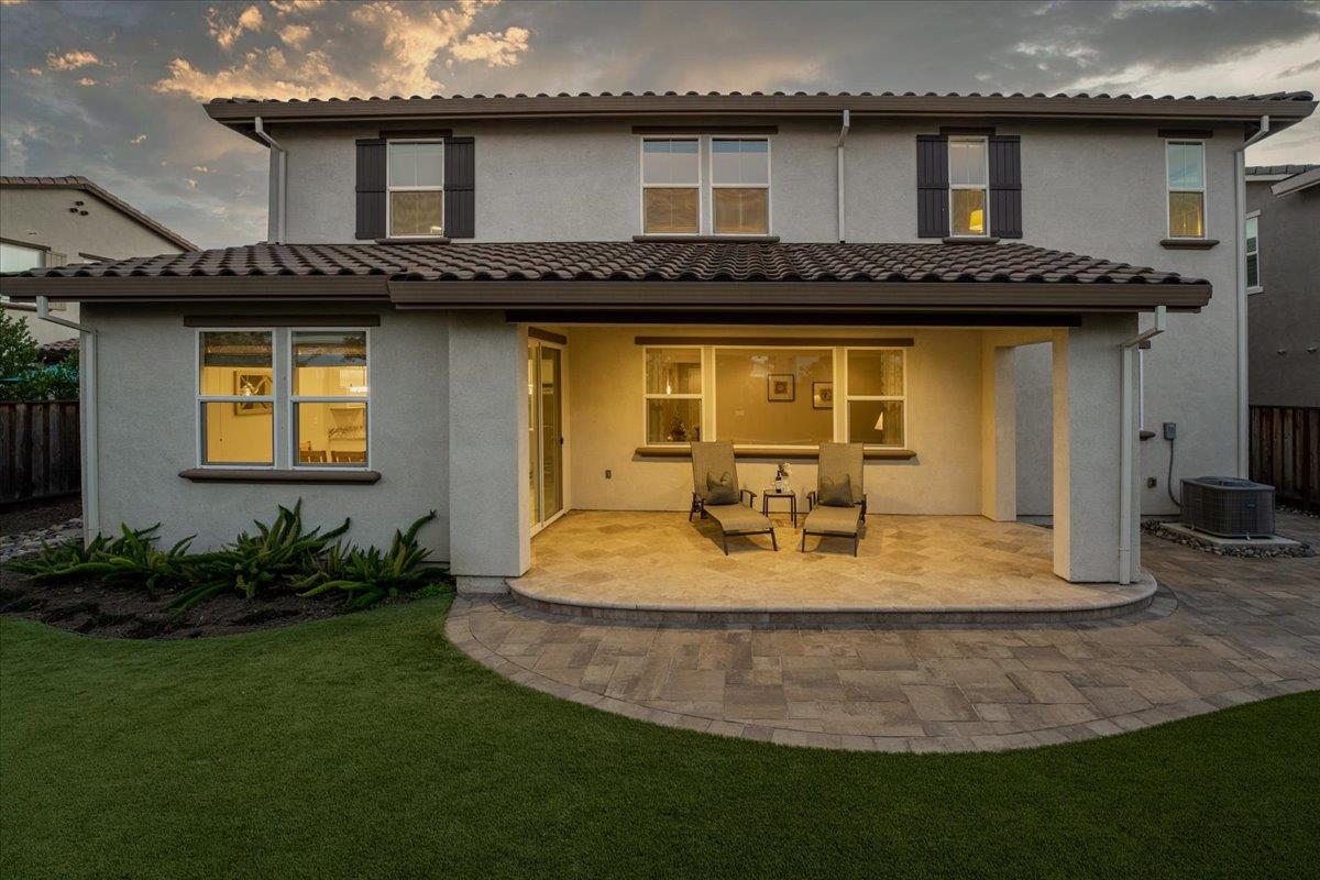 925 Lynx Place Gilroy, CA 95020 - Photo 37 of 49 a view of a house with tub and chairs