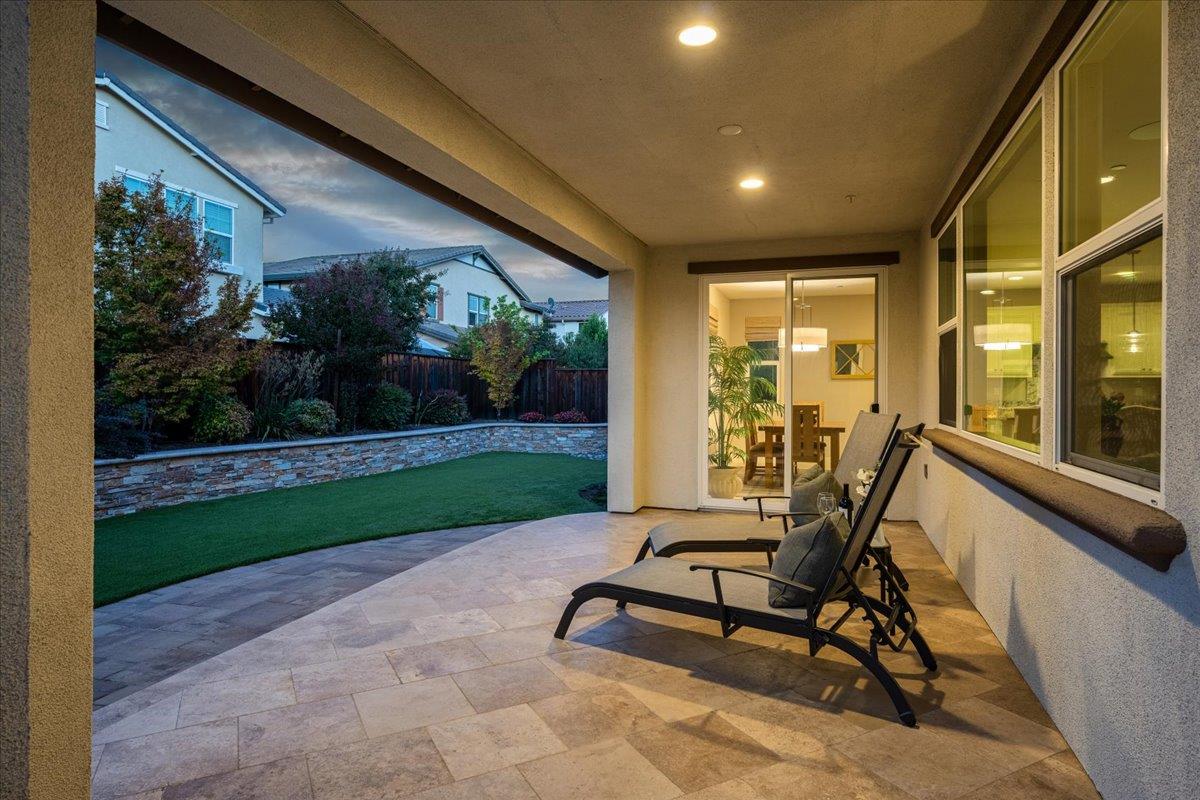 925 Lynx Place Gilroy, CA 95020 - Photo 40 of 49 a view of a chair and tables in the balcony