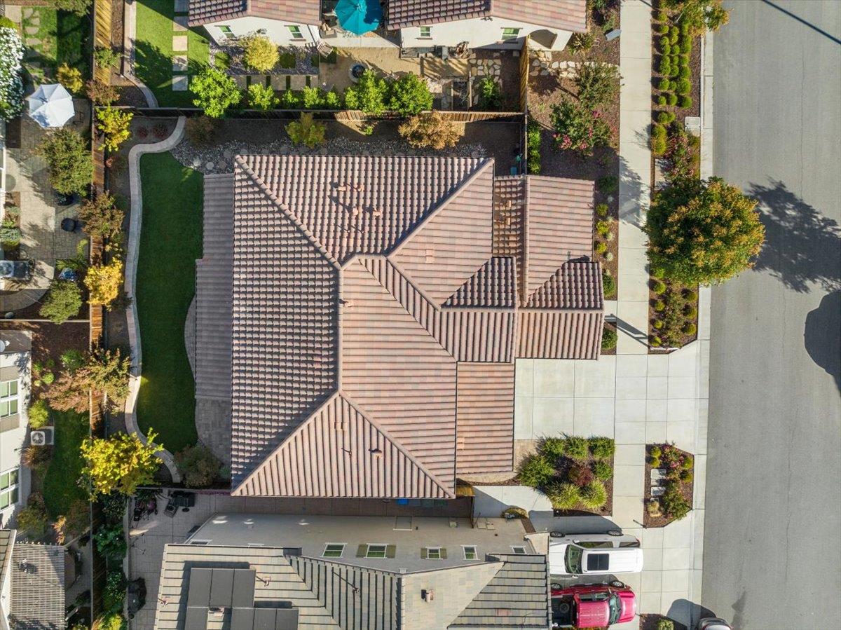 925 Lynx Place Gilroy, CA 95020 - Photo 43 of 49 a aerial view of a house with a yard and potted plants