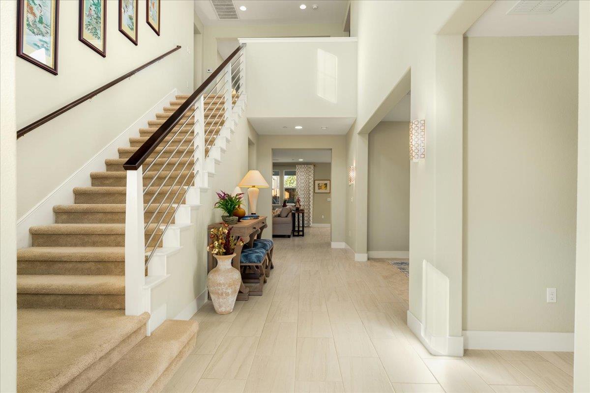 925 Lynx Place Gilroy, CA 95020 - Photo 8 of 49 a view of a livingroom with furniture and staircase