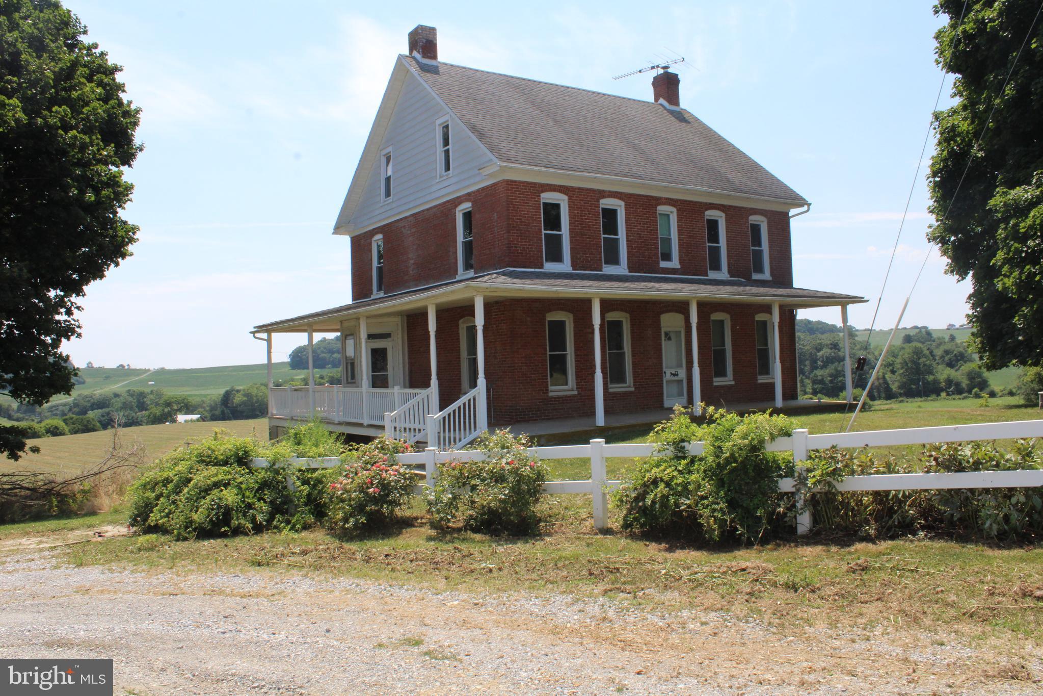 a view of a house with a garden