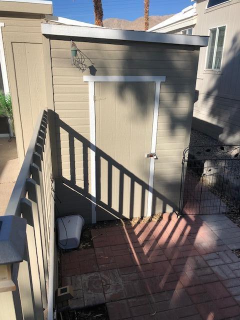 70200 Dillon Road, Unit 615 Desert Hot Springs, CA 92241 - Photo 24 of 32 Lower Patio with Shed