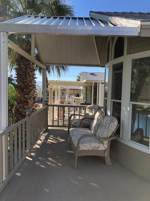 70200 Dillon Road, Unit 615 Desert Hot Springs, CA 92241 - Photo 28 of 32 Patio Sofa West View