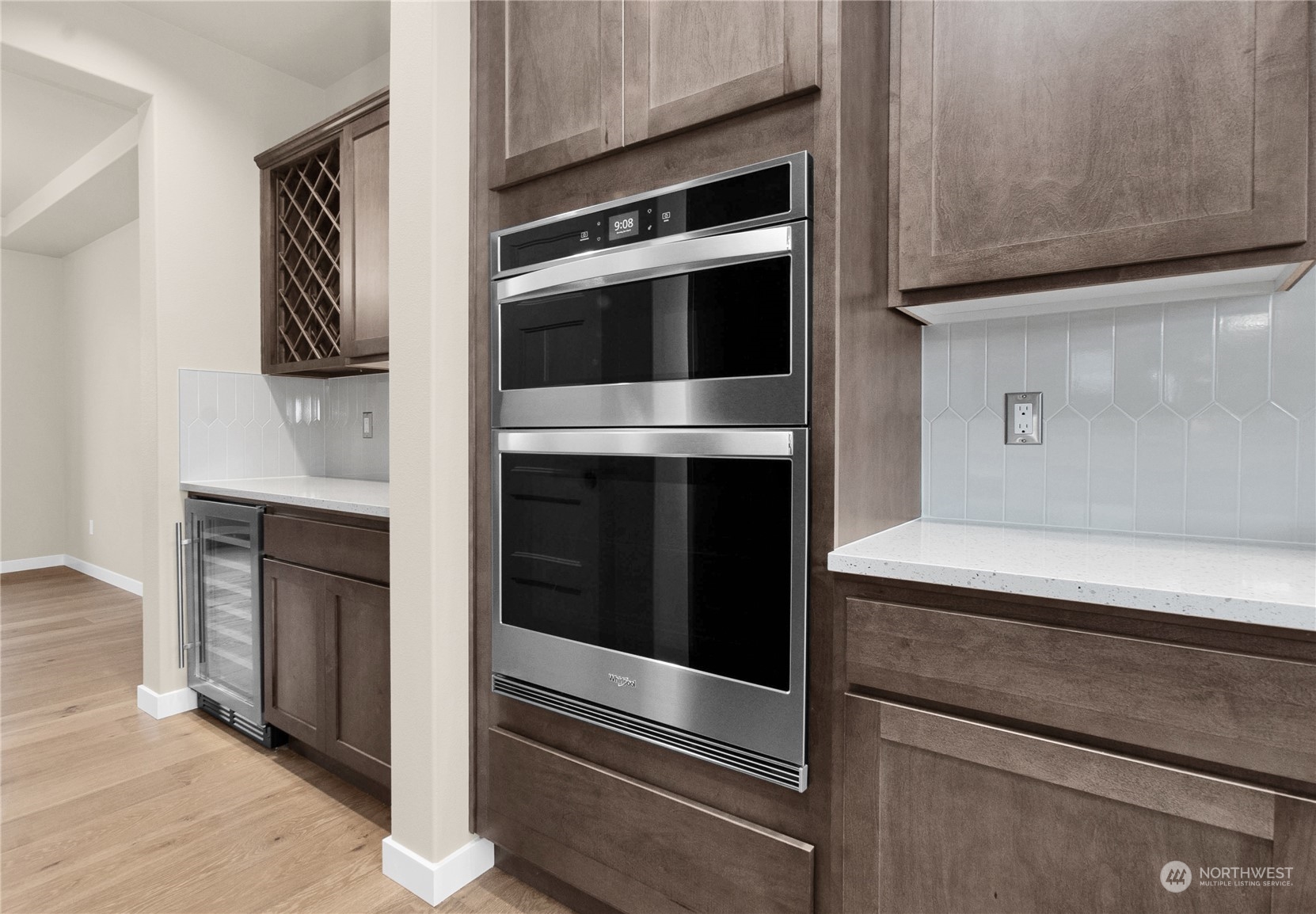 9741 7th Way Southeast Lacey, WA 98513 - Photo 13 of 40 a stove top oven sitting inside of a kitchen